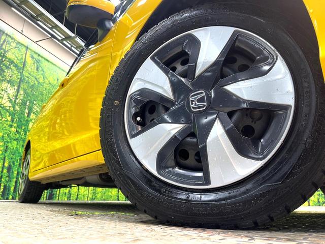 フィットハイブリッド Ｌ　ホンダセンシング　禁煙車　純正ＳＤナビ　バックカメラ　衝突被害軽減システム　ハーフレザーシート　スマートキー　ＬＥＤヘッド　ビルトインＥＴＣ　車線逸脱警報　オートライト　オートエアコン　Ｂｌｕｅｔｏｏｔｈ　ＣＤ（13枚目）