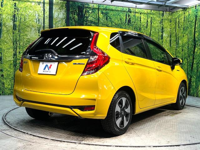 フィットハイブリッド Ｌ　ホンダセンシング　禁煙車　純正ＳＤナビ　バックカメラ　衝突被害軽減システム　ハーフレザーシート　スマートキー　ＬＥＤヘッド　ビルトインＥＴＣ　車線逸脱警報　オートライト　オートエアコン　Ｂｌｕｅｔｏｏｔｈ　ＣＤ（17枚目）
