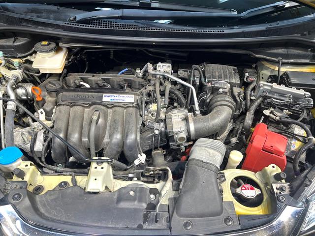 フィットハイブリッド Ｌ　ホンダセンシング　禁煙車　純正ＳＤナビ　バックカメラ　衝突被害軽減システム　ハーフレザーシート　スマートキー　ＬＥＤヘッド　ビルトインＥＴＣ　車線逸脱警報　オートライト　オートエアコン　Ｂｌｕｅｔｏｏｔｈ　ＣＤ（18枚目）