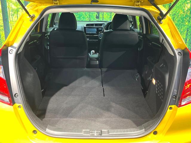 フィットハイブリッド Ｌ　ホンダセンシング　禁煙車　純正ＳＤナビ　バックカメラ　衝突被害軽減システム　ハーフレザーシート　スマートキー　ＬＥＤヘッド　ビルトインＥＴＣ　車線逸脱警報　オートライト　オートエアコン　Ｂｌｕｅｔｏｏｔｈ　ＣＤ（27枚目）