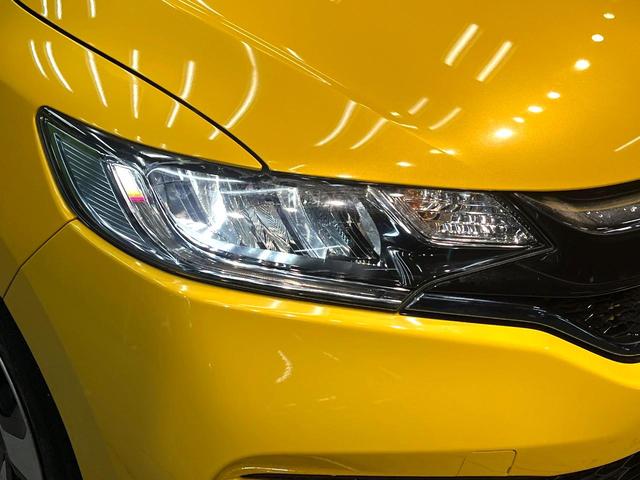 フィットハイブリッド Ｌ　ホンダセンシング　禁煙車　純正ＳＤナビ　バックカメラ　衝突被害軽減システム　ハーフレザーシート　スマートキー　ＬＥＤヘッド　ビルトインＥＴＣ　車線逸脱警報　オートライト　オートエアコン　Ｂｌｕｅｔｏｏｔｈ　ＣＤ（34枚目）