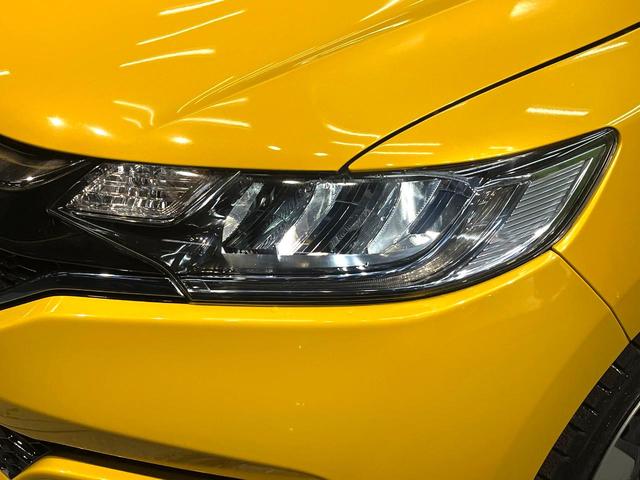 フィットハイブリッド Ｌ　ホンダセンシング　禁煙車　純正ＳＤナビ　バックカメラ　衝突被害軽減システム　ハーフレザーシート　スマートキー　ＬＥＤヘッド　ビルトインＥＴＣ　車線逸脱警報　オートライト　オートエアコン　Ｂｌｕｅｔｏｏｔｈ　ＣＤ（35枚目）