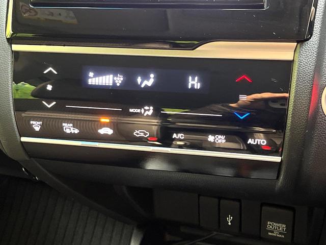 フィットハイブリッド Ｌ　ホンダセンシング　禁煙車　純正ＳＤナビ　バックカメラ　衝突被害軽減システム　ハーフレザーシート　スマートキー　ＬＥＤヘッド　ビルトインＥＴＣ　車線逸脱警報　オートライト　オートエアコン　Ｂｌｕｅｔｏｏｔｈ　ＣＤ（62枚目）