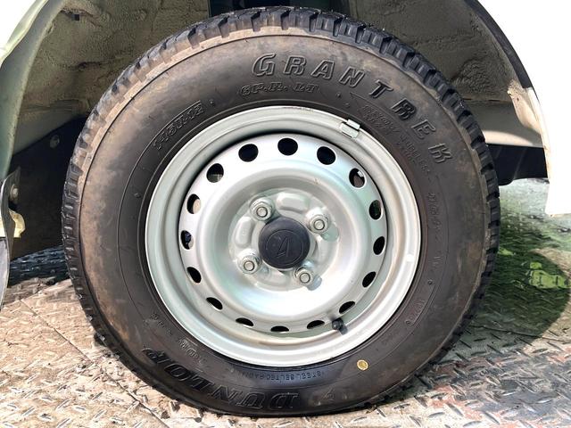 ハイゼットトラック スタンダード　４ＷＤ　ＭＴ車　禁煙車　オーディオ　エアコン　ヘッドライトレベライザー　パワーステアリング　荷台三方開き　サイドバイザー　シガーソケット（50枚目）