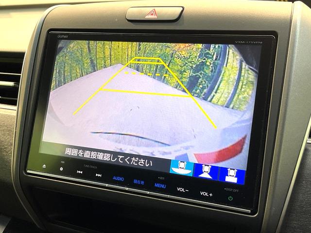 フリードハイブリッド ハイブリッド・ＥＸ　エアロ　両側電動ドア　純正ＳＤナビ　後席モニター　バックカメラ　衝突被害軽減システム　禁煙車　ハーフレザーシート　ドラレコ　スマートキー　ＬＥＤヘッド　ビルトインＥＴＣ　車線逸脱警報　オートライト（4枚目）