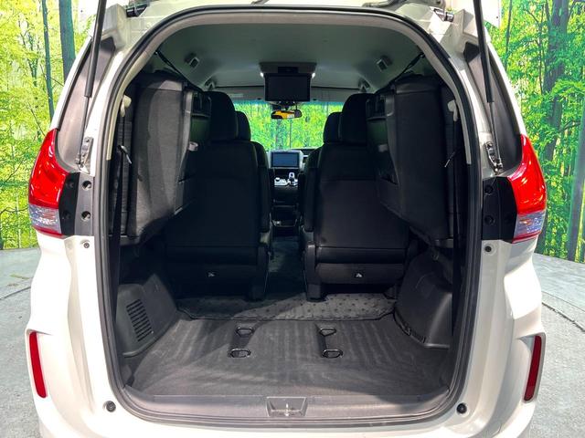 フリードハイブリッド ハイブリッド・ＥＸ　エアロ　両側電動ドア　純正ＳＤナビ　後席モニター　バックカメラ　衝突被害軽減システム　禁煙車　ハーフレザーシート　ドラレコ　スマートキー　ＬＥＤヘッド　ビルトインＥＴＣ　車線逸脱警報　オートライト（12枚目）