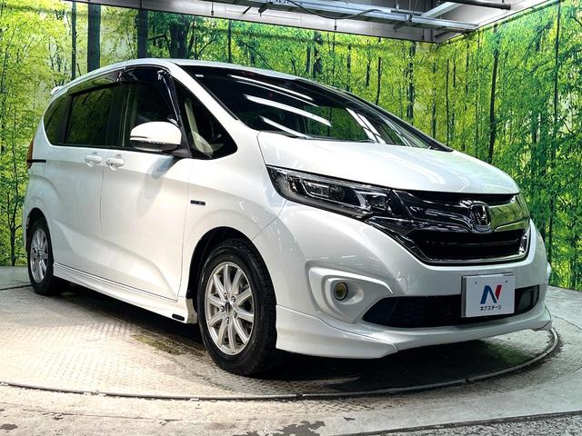 フリードハイブリッド ハイブリッド・ＥＸ　エアロ　両側電動ドア　純正ＳＤナビ　後席モニター　バックカメラ　衝突被害軽減システム　禁煙車　ハーフレザーシート　ドラレコ　スマートキー　ＬＥＤヘッド　ビルトインＥＴＣ　車線逸脱警報　オートライト（18枚目）