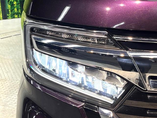 Ｎ－ＢＯＸカスタム Ｌターボ　ターボ　両側電動ドア　純正８型ナビ　バックカメラ　衝突被害軽減システム　禁煙車　ハーフレザーシート　コーナーセンサー　スマートキー　ＬＥＤヘッド　ビルトインＥＴＣ　純正１５インチアルミ（12枚目）