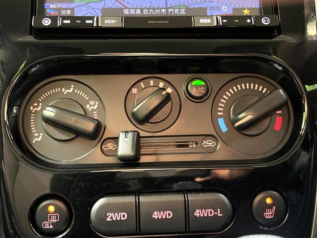 ジムニー ランドベンチャー　禁煙車　４ＷＤ　純正ＳＤナビ　シートヒーター　純正１６インチアルミ　Ｂｌｕｅｔｏｏｔｈ再生　フルセグ　ＣＤ／ＤＶＤ再生　プライバシーガラス　ステアリングスイッチ　革巻きステアリング　フォグライト（7枚目）