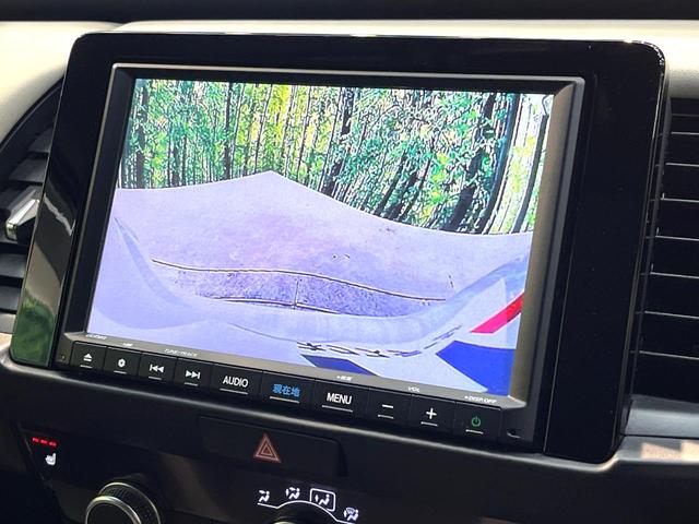 フィット e:HEVホーム 20周年特別仕様車 メゾン 禁煙車 純正8型ナビ バックカメラ 衝突被害軽減システム レーダークルーズ ETC フルセグ コーナーセンサー スマートキー LEDヘッド 純正16インチアルミ オートハイビーム 車線逸脱警報(4枚目)