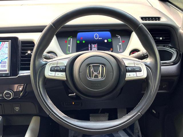 フィット e:HEVホーム 20周年特別仕様車 メゾン 禁煙車 純正8型ナビ バックカメラ 衝突被害軽減システム レーダークルーズ ETC フルセグ コーナーセンサー スマートキー LEDヘッド 純正16インチアルミ オートハイビーム 車線逸脱警報(11枚目)