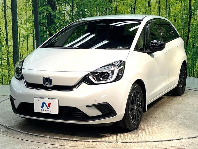 フィット e:HEVホーム 20周年特別仕様車 メゾン 禁煙車 純正8型ナビ バックカメラ 衝突被害軽減システム レーダークルーズ ETC フルセグ コーナーセンサー スマートキー LEDヘッド 純正16インチアルミ オートハイビーム 車線逸脱警報(27枚目)