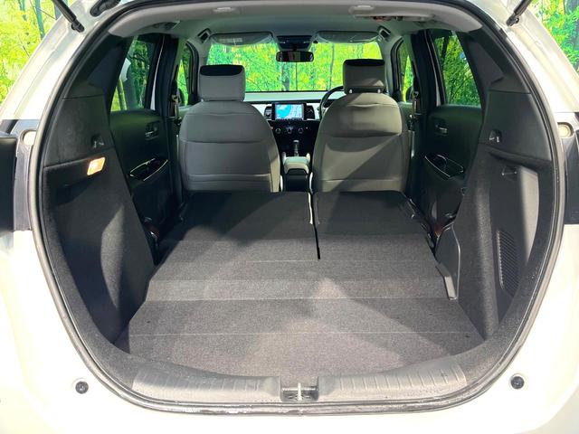 フィット e:HEVホーム 20周年特別仕様車 メゾン 禁煙車 純正8型ナビ バックカメラ 衝突被害軽減システム レーダークルーズ ETC フルセグ コーナーセンサー スマートキー LEDヘッド 純正16インチアルミ オートハイビーム 車線逸脱警報(33枚目)