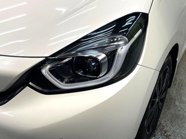 フィット e:HEVホーム 20周年特別仕様車 メゾン 禁煙車 純正8型ナビ バックカメラ 衝突被害軽減システム レーダークルーズ ETC フルセグ コーナーセンサー スマートキー LEDヘッド 純正16インチアルミ オートハイビーム 車線逸脱警報(34枚目)