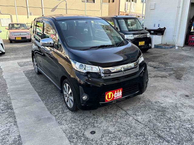 ｅＫカスタム Ｔ　ＥＴＣ　バックカメラ　ナビ　ＴＶ　ＨＩＤ　スマートキー　電動格納ミラー　ベンチシート　ＣＶＴ　盗難防止システム　ＡＢＳ　ＣＤ　ＵＳＢ　ミュージックプレイヤー接続可　アルミホイール　衝突安全ボディ（14枚目）
