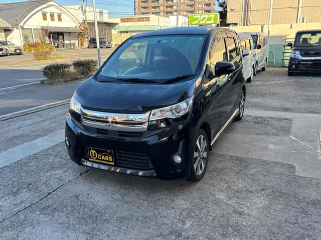 ｅＫカスタム Ｔ　バックカメラ　ＴＶ　オートライト　ＨＩＤ　スマートキー　電動格納ミラー　ベンチシート　ＣＶＴ　盗難防止システム　ＡＢＳ　アルミホイール　衝突安全ボディ　エアコン　パワーステアリング　パワーウィンドウ（9枚目）