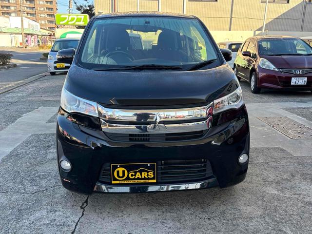 ｅＫカスタム Ｔ　バックカメラ　ＴＶ　オートライト　ＨＩＤ　スマートキー　電動格納ミラー　ベンチシート　ＣＶＴ　盗難防止システム　ＡＢＳ　アルミホイール　衝突安全ボディ　エアコン　パワーステアリング　パワーウィンドウ（10枚目）