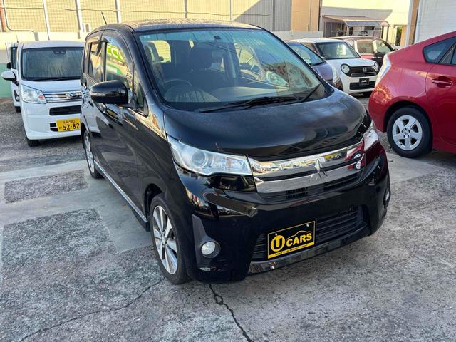 ｅＫカスタム Ｔ　バックカメラ　ＴＶ　オートライト　ＨＩＤ　スマートキー　電動格納ミラー　ベンチシート　ＣＶＴ　盗難防止システム　ＡＢＳ　アルミホイール　衝突安全ボディ　エアコン　パワーステアリング　パワーウィンドウ（11枚目）