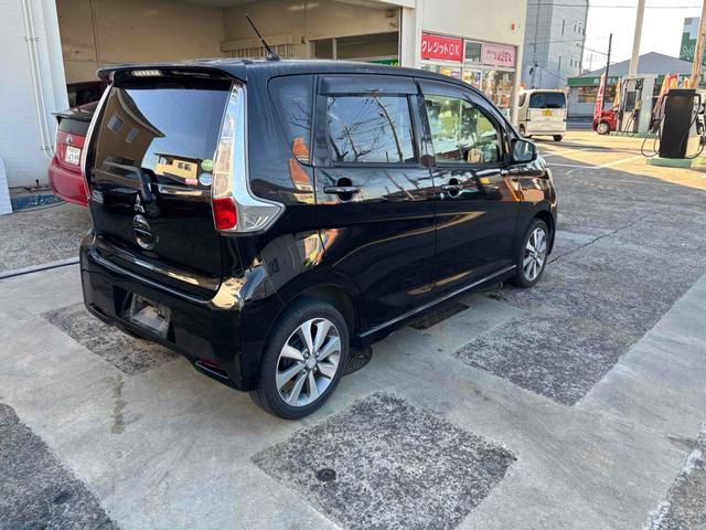 ｅＫカスタム Ｔ　バックカメラ　ＴＶ　オートライト　ＨＩＤ　スマートキー　電動格納ミラー　ベンチシート　ＣＶＴ　盗難防止システム　ＡＢＳ　アルミホイール　衝突安全ボディ　エアコン　パワーステアリング　パワーウィンドウ（13枚目）