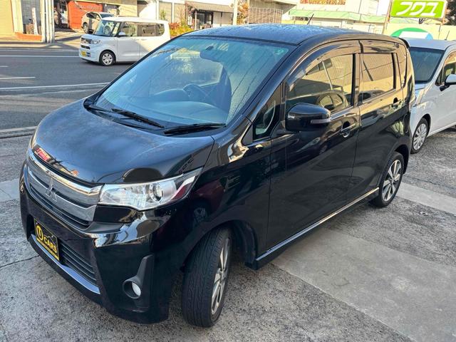 ｅＫカスタム Ｔ　バックカメラ　ＴＶ　オートライト　ＨＩＤ　スマートキー　電動格納ミラー　ベンチシート　ＣＶＴ　盗難防止システム　ＡＢＳ　アルミホイール　衝突安全ボディ　エアコン　パワーステアリング　パワーウィンドウ（17枚目）