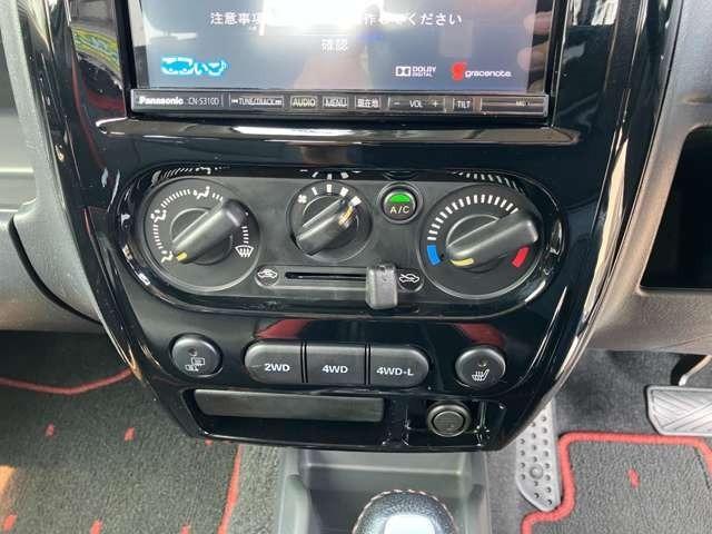 ジムニー クロスアドベンチャー　４ＷＤ　ナビ地デジＴＶ　Ｂｌｕｅｔｏｏｔｈ　キーレスエントリー　シートヒーター　純正アルミホイール　背面タイヤ・ハードカバー付（9枚目）