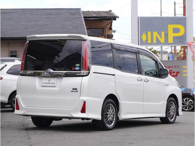 ノア Ｓｉ　ダブルバイビー　車線逸脱　クルーズＣ　ブレーキサポート　エアコン　ウォークスルー　ＡＵＸ　ＬＥＤライト　ナビ＆ＴＶ　横滑防止装置　アルミホイール　パワーウインドウ　フルセグ　盗難防止　ＡＨＢ　ＤＶＤ再生可　ＥＴＣ（24枚目）