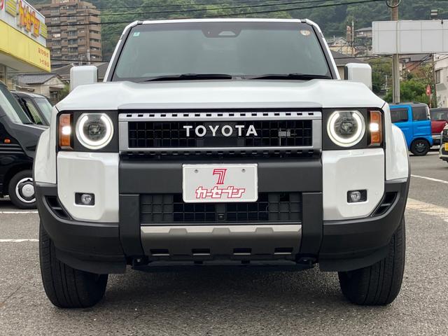 ランドクルーザー２５０ ＶＸ　コーナーセンサ　Ｒカメラ　Ｐシート　レーンキープ　地デジ　プリクラッシュセーフティ　アルミホイール　ＬＥＤヘッド　３列シート　オートマチックハイビーム　ＥＴＣ　ＴＶ　４ＷＤ　スマートキー　ルーフレール（6枚目）