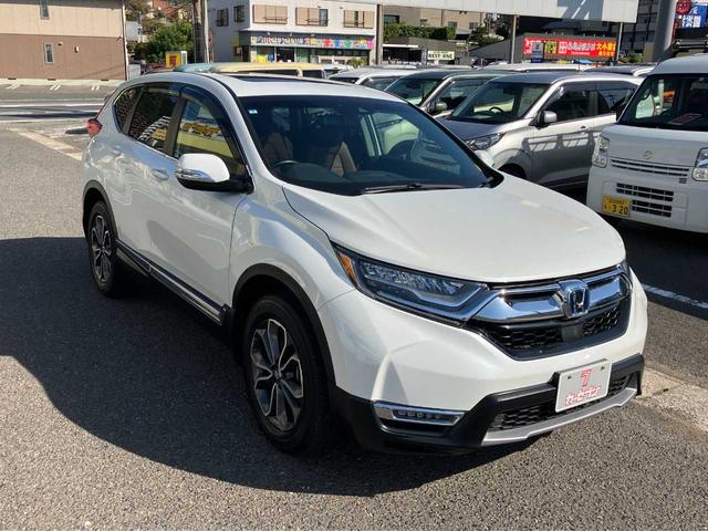ＣＲ－Ｖハイブリッド ｅ：ＨＥＶ　ＥＸ・マスターピース　衝突被害軽減Ｂ　横滑り防止装置　サンルーフ　クルーズコントロール　ソナー　バックモニター　盗難防止システム　スマートキー　本革シート　電動バックドア　ステアリングヒーター　シートヒーター（前後）（61枚目）