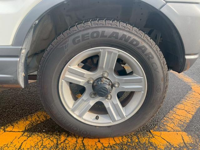 ジムニー ランドベンチャー　ルーフレール付　前席パワーウインドウ　助手席エアバック　ＡＷ　運転席エアバッグ　４ＷＤ車　キーレス付　ＰＳ　ＡＢＳ付　シートヒータ　ＥＴＣ　ターボー　ＡＴエアコン（18枚目）