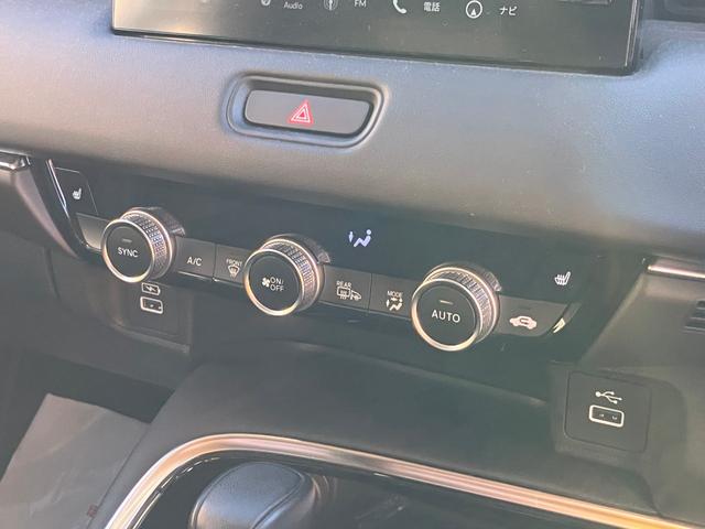 ヴェゼル ｅ：ＨＥＶ　Ｚ　車線逸脱警告　シートＨ　サイドエアＢ　ＡＴハイビーム　パークセンサー　リヤカメラ　ＥＳＣ　パワステ　ＡＷ　ＡＡＣ　エアバック　ＤＡＣ　ＡＢＳ　アイドリングストップ　アダプティブＣＣ　キーフリーシステム（57枚目）