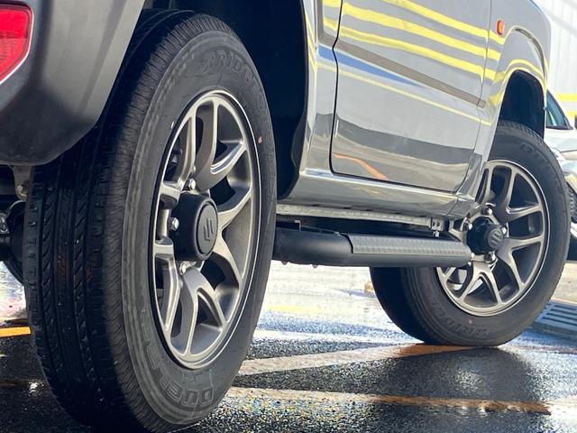 ジムニー ＸＣ　衝突低減ブレーキ　アイドリングストップ付　前後ソナー　Ｓヒーター　パワステ　切替式４ＷＤ　フルフラットシート　セキュリティ　車線逸脱警告　フルオートエアコン　横滑り防止システム　エアバック　ＡＨＢ（30枚目）