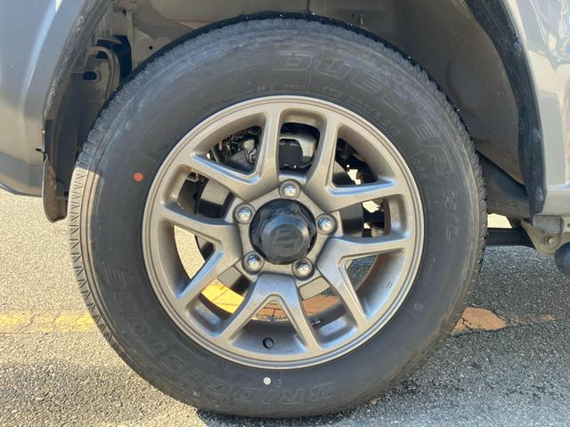 ジムニー ＸＣ　衝突低減ブレーキ　アイドリングストップ付　前後ソナー　Ｓヒーター　パワステ　切替式４ＷＤ　フルフラットシート　セキュリティ　車線逸脱警告　フルオートエアコン　横滑り防止システム　エアバック　ＡＨＢ（34枚目）