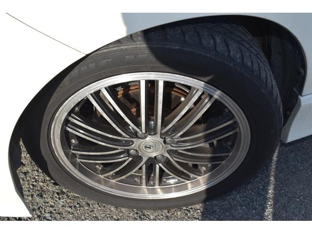 フリードハイブリッド ジャストセレクション　スマートキー　純正ＨＤＤナビ　ベンチシート　オートエアコン　バックカメラ　左側パワースライドドア　社外ホイール　７人乗りフリップダウンモニター　ＥＴＣ（9枚目）