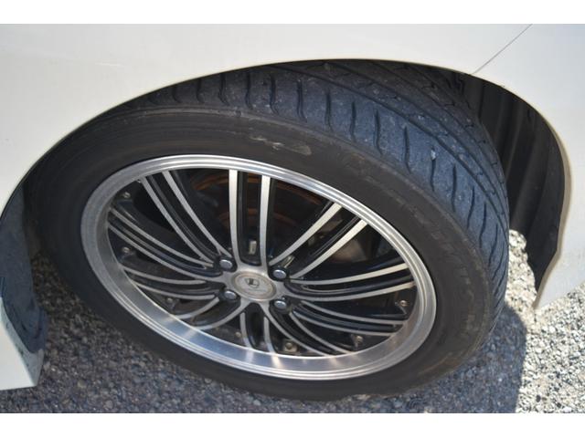 フリードハイブリッド ジャストセレクション　スマートキー　純正ＨＤＤナビ　ベンチシート　オートエアコン　バックカメラ　左側パワースライドドア　社外ホイール　７人乗りフリップダウンモニター　ＥＴＣ（10枚目）