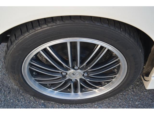 フリードハイブリッド ジャストセレクション　スマートキー　純正ＨＤＤナビ　ベンチシート　オートエアコン　バックカメラ　左側パワースライドドア　社外ホイール　７人乗りフリップダウンモニター　ＥＴＣ（11枚目）