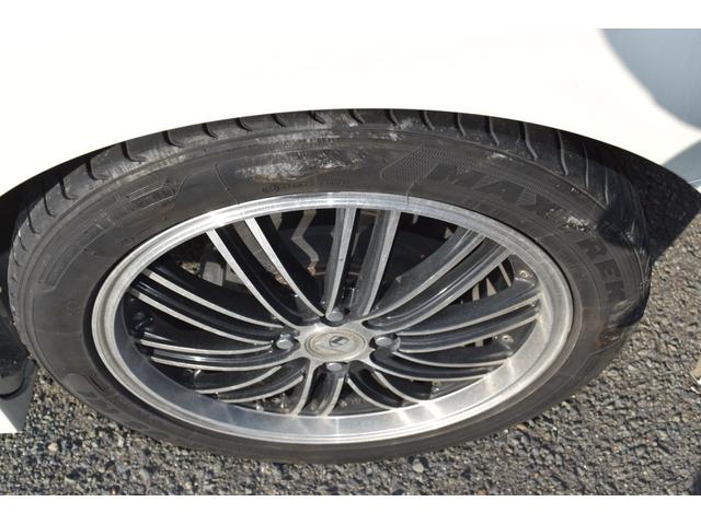 フリードハイブリッド ジャストセレクション　スマートキー　純正ＨＤＤナビ　ベンチシート　オートエアコン　バックカメラ　左側パワースライドドア　社外ホイール　７人乗りフリップダウンモニター　ＥＴＣ（12枚目）