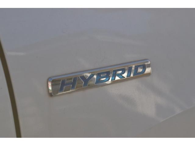 フリードハイブリッド ジャストセレクション　スマートキー　純正ＨＤＤナビ　ベンチシート　オートエアコン　バックカメラ　左側パワースライドドア　社外ホイール　７人乗りフリップダウンモニター　ＥＴＣ（15枚目）