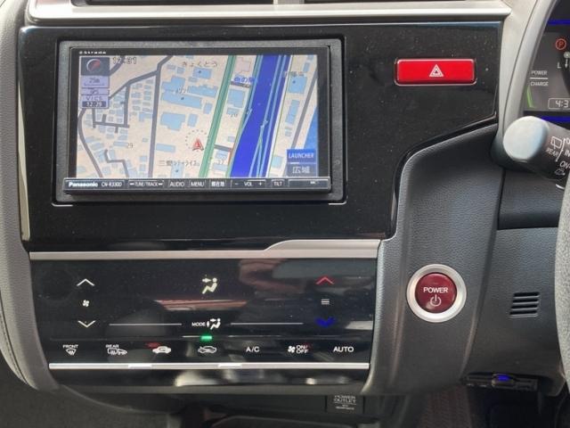 フィットハイブリッド Ｌパッケージ　キーレス　フルセグ　ナビ＆ＴＶ　１５アルミホイール　エアバッグ　オートマ　ディーラー車　助手席エアバッグ　ＥＴＣ　バックカメラ　スマートキー　オートクルーズコントロール（15枚目）