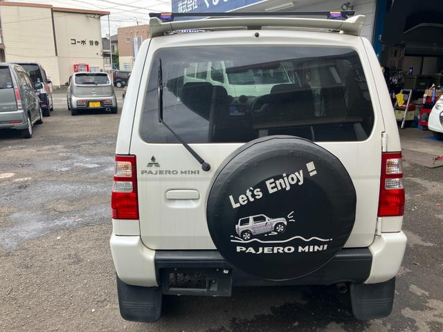 パジェロミニ ナビエディションＶＲ　４ＷＤ　インタークーラーターボ　ＴＥＲＺＯルーフラック　禁煙車　ＨＤＤナビフルセグＴＶ　ＥＴＣ　ミュージックキャッチャー　キーレス　背面タイヤ　取扱説明書　整備点検記録簿（15枚目）