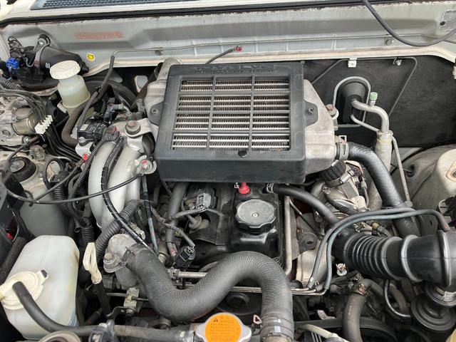 パジェロミニ ナビエディションＶＲ　４ＷＤ　インタークーラーターボ　ＴＥＲＺＯルーフラック　禁煙車　ＨＤＤナビフルセグＴＶ　ＥＴＣ　ミュージックキャッチャー　キーレス　背面タイヤ　取扱説明書　整備点検記録簿（36枚目）