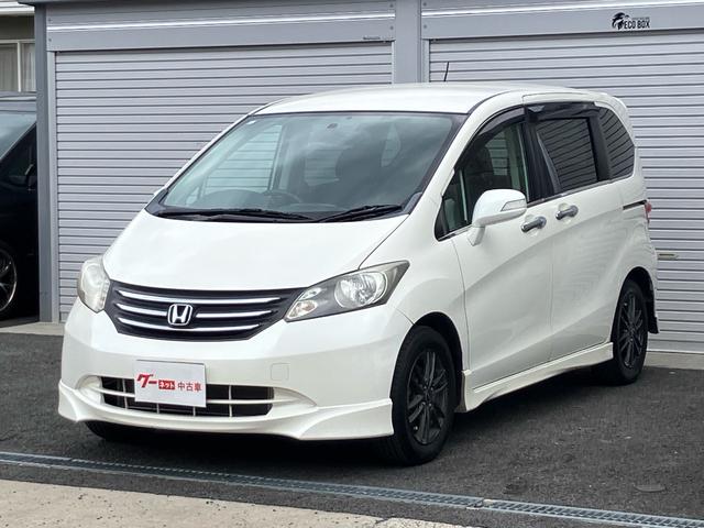 フリード Ｇ　エアロ　Ｌパッケージ　ナビ・ワンセグＴＶ／バックカメラ／ＥＴＣ／ＣＤ・ＤＶＤ再生／オートエアコン／両側スライドドア・左リア電動／８人乗り／車検整備付き（4枚目）