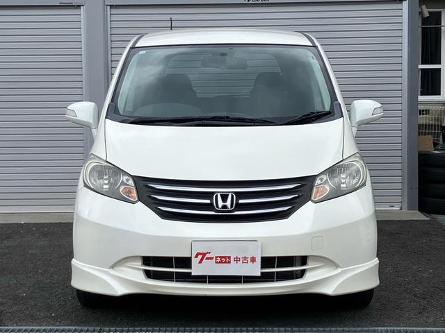 フリード Ｇ　エアロ　Ｌパッケージ　ナビ・ワンセグＴＶ／バックカメラ／ＥＴＣ／ＣＤ・ＤＶＤ再生／オートエアコン／両側スライドドア・左リア電動／８人乗り／車検整備付き（5枚目）