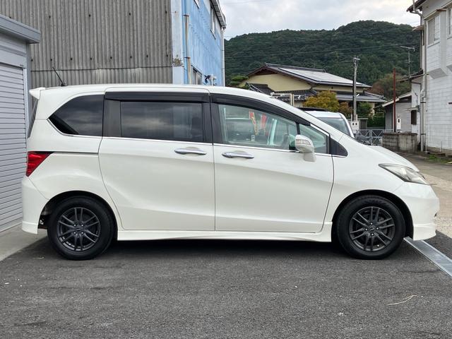 フリード Ｇ　エアロ　Ｌパッケージ　ナビ・ワンセグＴＶ／バックカメラ／ＥＴＣ／ＣＤ・ＤＶＤ再生／オートエアコン／両側スライドドア・左リア電動／８人乗り／車検整備付き（9枚目）