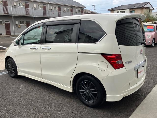 フリード Ｇ　エアロ　Ｌパッケージ　ナビ・ワンセグＴＶ／バックカメラ／ＥＴＣ／ＣＤ・ＤＶＤ再生／オートエアコン／両側スライドドア・左リア電動／８人乗り／車検整備付き（11枚目）