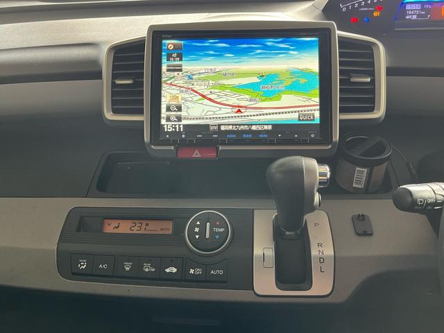 フリードハイブリッド ジャストセレクション　ナビテレビ　バックカメラ　後席フリップダウンモニター　ＥＴＣ　ドライブレコーダー　両側パワースライドドア　ハーフレザーシート　本革巻ステアリング　社外アルミホイール（24枚目）