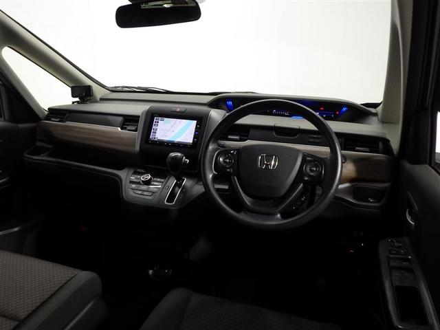 フリード Ｇ・ホンダセンシング　フルセグ　メモリーナビ　ＤＶＤ再生　バックカメラ　衝突被害軽減システム　ＥＴＣ　両側電動スライド　ウオークスルー　乗車定員６人　３列シート　盗難防止装置　ＣＤ　スマートキー　オートクルーズコントロール（5枚目）