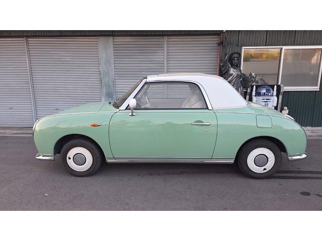 フィガロ 　Ｂｌｕｅｔｏｏｔｈオーディオ　メモリーナビ　ＴＶ　パワステ　パワーウィンドウ　エアコン　オートマチック（3枚目）