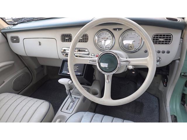 フィガロ 　Ｂｌｕｅｔｏｏｔｈオーディオ　メモリーナビ　ＴＶ　パワステ　パワーウィンドウ　エアコン　オートマチック（10枚目）