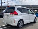 フリードハイブリッド ハイブリッド・Ｇホンダセンシング　緊急ブレーキ　車線維持支援システム　ＬＥＤヘットランプ　クルーズＣ　ＥＣＯＮ　横滑り防止機能　バックモニター　衝突安全ボディ　スマートキー＆プッシュスタート　ＥＴＣ　３列シート　オートエアコン　ＡＢＳ（6枚目）