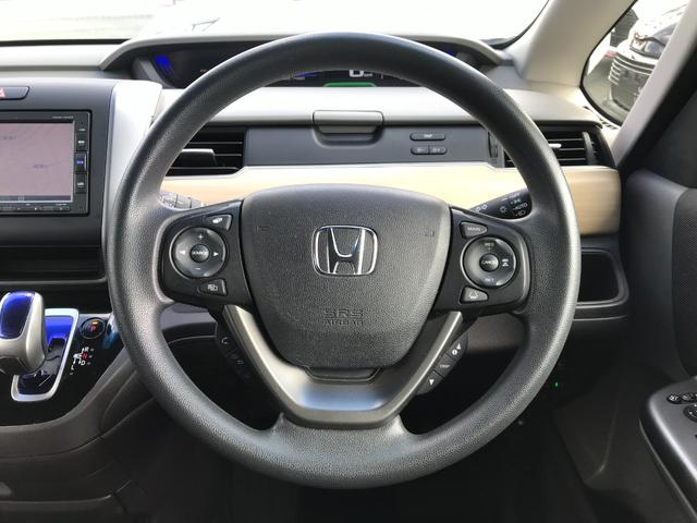 フリードハイブリッド ハイブリッド・Ｇホンダセンシング　ハイブリッド　ＥＴＣ　バックカメラ　ナビ　両側電動スライドドア　オートクルーズコントロール　レーンアシスト　衝突被害軽減システム　オートライト　ＬＥＤヘッドランプ　スマートキー　ＡＴ　盗難防止システム（3枚目）